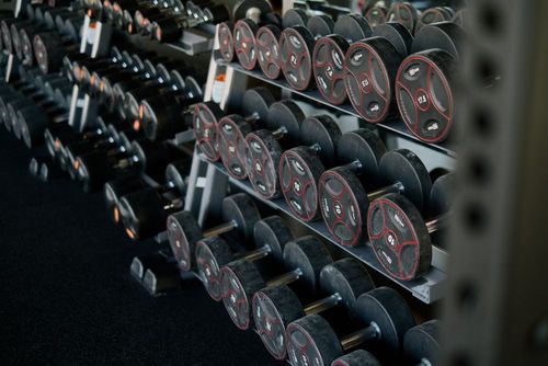 A rack of dumbbells in a gym