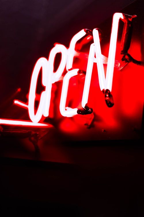 Red illuminated OPEN neon sign